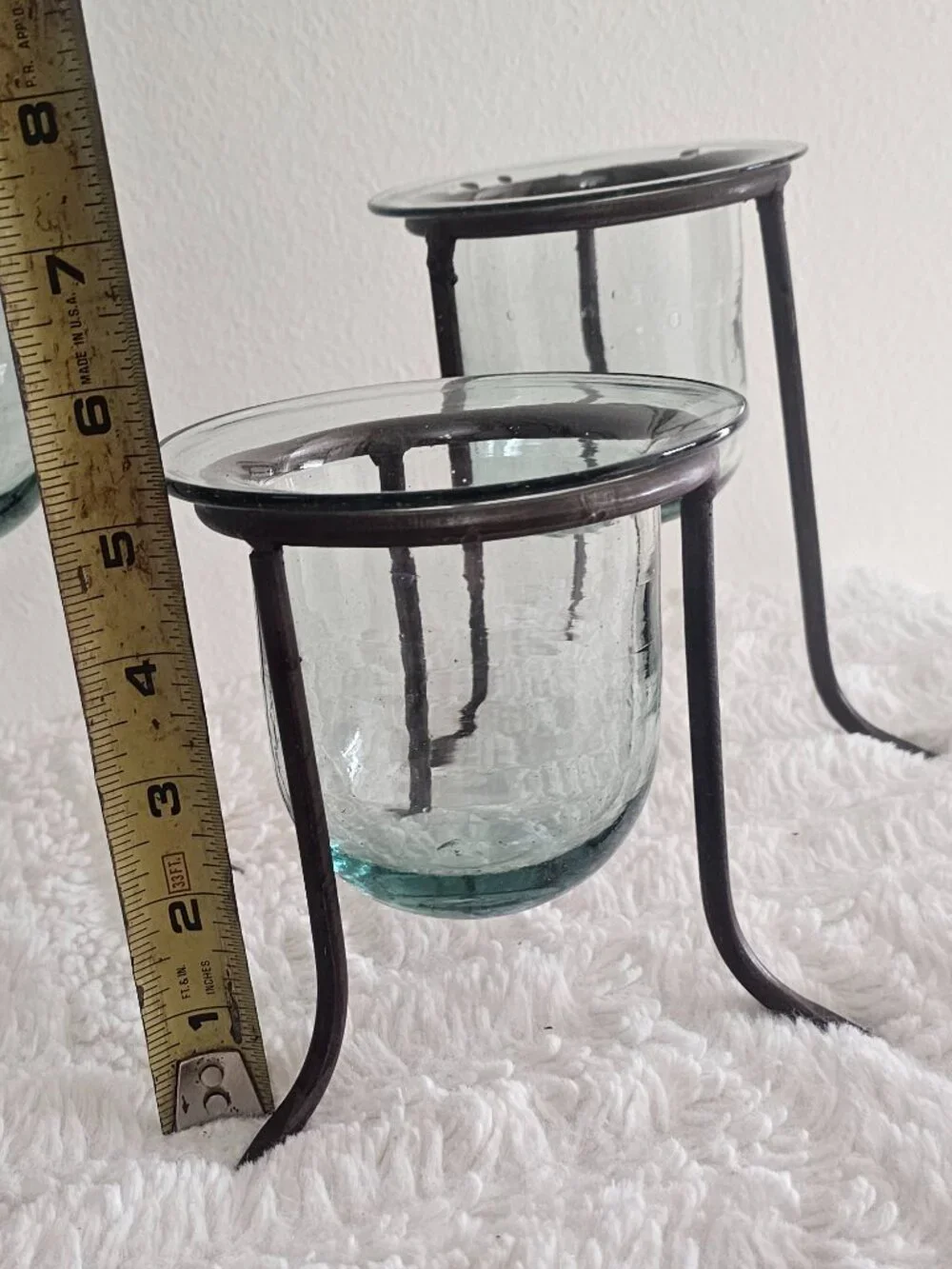 Wrought iron and hand-blown glass candle holders